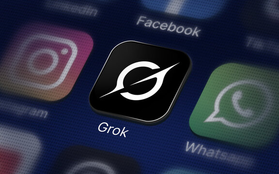 Grok Company logo on the smartphone