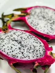 Fresh Cutted Pitahaya Slices Closeup Food Photoshoot. Detailed Exotic Fruit Texture. Still life 