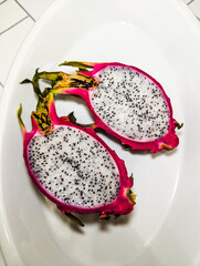 Fresh Cutted Pitahaya Slices Closeup Food Photoshoot. Detailed Exotic Fruit Texture. Still life 
