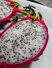 Fresh Cutted Pitahaya Slices Closeup Food Photoshoot. Detailed Exotic Fruit Texture. Still life 