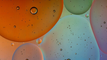 Vibrant oil bubbles in water creating an abstract colorful background