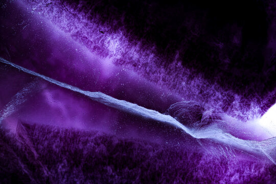 Polished fluorite purple and blue zoning. Specimen from China. macro photography detail texture. close-up polished mineral crystal gemstone.
