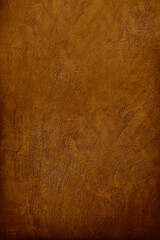 Black dark red brown burnt orange rough grunge texture background. Toned concrete wall surface. Close-up. Empty blank space design ad.