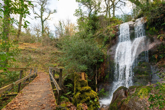 Cascata da Laja Waterfall and Wooden Bridge. Peneda-Geres National Park in Portugal