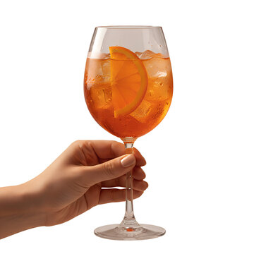 Hand holding stylish aperol spritz cocktail in a wine glass, with orange slice and ice, perfect for summer, brunch, or italian aperitivo concepts