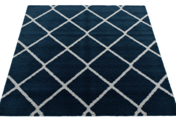 A deep blue luxurious shaggy rectangular area rug with light grey woven diamond patterns, against a seamless transparent background with copy space, clean home decor concept