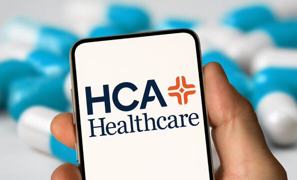 HCA Healthcare brand logo displayed on smartphone