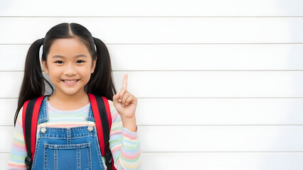 Capture the essence of youthful enthusiasm with this adorable Asian schoolgirl, ready to learn and explore, a perfect image for educational themes and more.