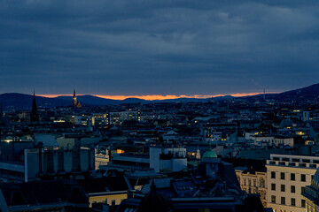 Vienna Cityscape at Dark Twilight with Distant Orange Horizon Gl