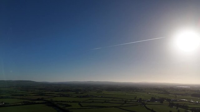 Aerial View of Rural Countryside Under Bright Sun