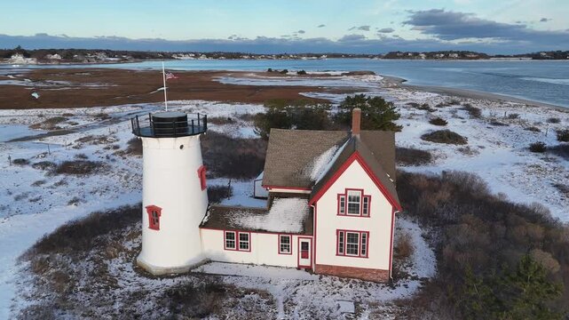 Drone Aerial of Chatham, Cape Cod Coastline and Lighthouse in Winter