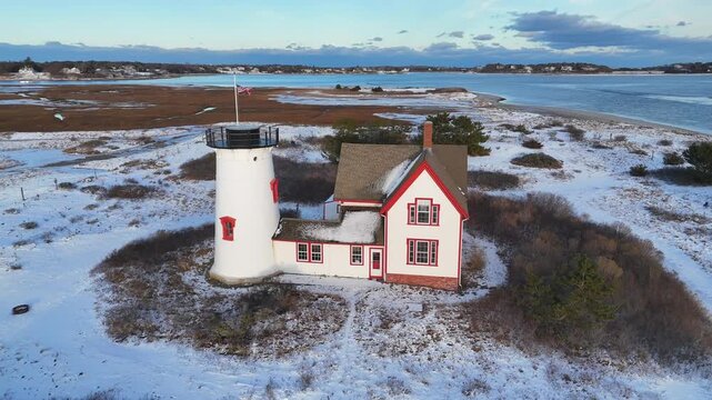 Drone Aerial of Chatham, Cape Cod Coastline and Lighthouse in Winter