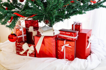 Decorated Christmas Gifts in Living Room under Chrismass tree