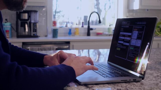 Middle Aged Man Runs Tax Assessment for Home Based Small Business Preparing for Tax Season and Prepayments Concept