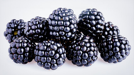 Fresh Boysenberries Isolated on White Background, Dark Juicy Hybrid Berries with Sweet-Tart Flavor...