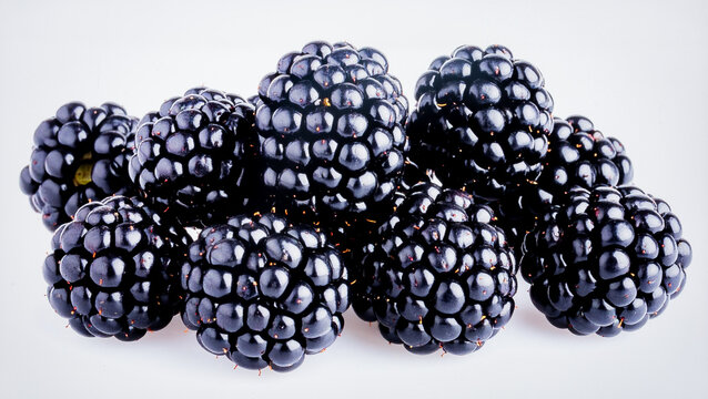 Fresh Boysenberries Isolated on White Background, Dark Juicy Hybrid Berries with Sweet-Tart Flavor and Natural Nutrients Concept
