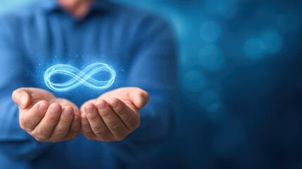 Glowing infinity symbol hands blue background close up minimal style abstract
