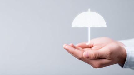 Hands offering glowing insurance umbrella icon symbolizing protection and financial security with soft lighting and neutral background