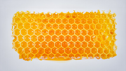 Fresh Honeycomb Isolated on White Background, Natural Sweet Product Rich in Enzymes and Antioxidants for Healthy Food Concept