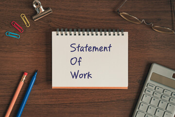 There is notebook with the word Statement Of Work. It is as an eye-catching image.