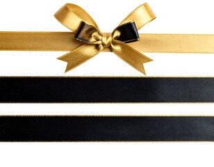 Golden ribbon gift bow with black trim detail, positioned atop two solid black ribbons with gold edging, all on a white background