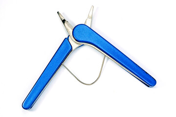 A pair of pliers with blue handles, placed on a white background.