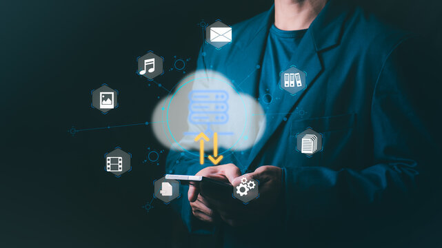 Businessman using a smartphone for cloud computing, data transfer, and digital file management, Concept for server storage, networking, online database, and futuristic information technology. - Powered by Adobe