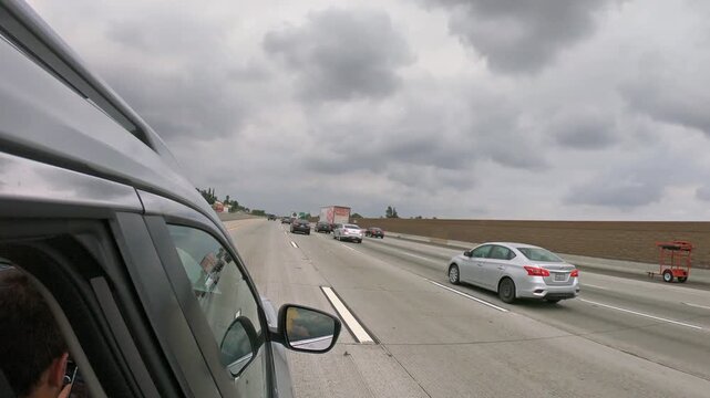 Driving POV on the I-10 highway from Los Angeles, road trip to Las Vegas and Nevada desert. Friends, roadtrip, drive concept