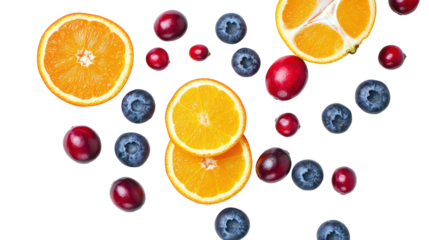 Colorful winter fruit mix of blueberries cranberries apples and citrus on transparent background