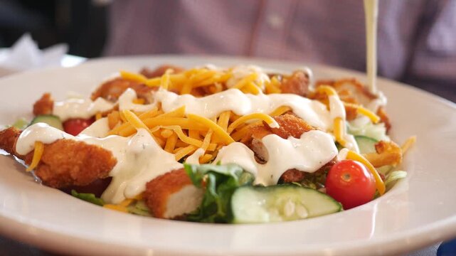  Man Pours Ranch Dressing over Cheesy Fried Chicken Salad