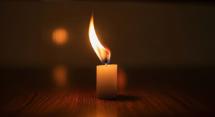 Burning White Candle Flame Close-Up in Warm Dark Ambient Lighting