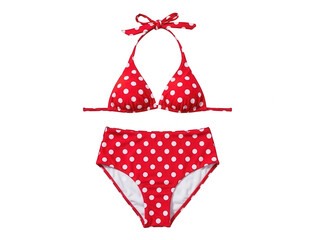 A red and white polka dot bikini set isolated on a black background
