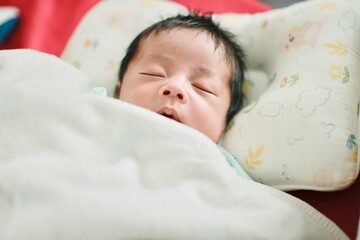 baby sleeping in bed