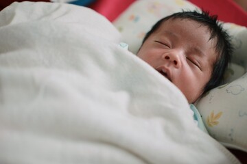 baby sleeping in bed