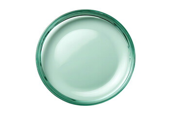 Glass dish filled with pale green, translucent liquid
