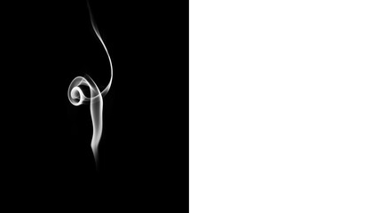 Ethereal smoke swirls on black background