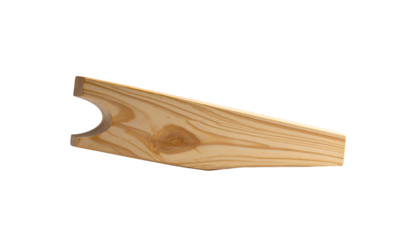A close-up view presents a wooden, wedge-shaped object with a curved indentation at one end, revealing wood grain. Isolated on black