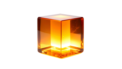 A luminous, transparent cube glows with an inner light against a stark black backdrop, creating a captivating visual effect