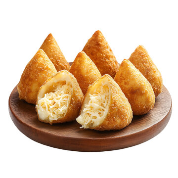 Crispy fried coxinhas filled with shredded chicken and cheese served on a wooden plate a popular Brazilian snack perfect for p