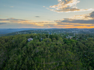 Scenic elevated views of the Australia flag on display at the Picnic Point public park area in Toowoomba with Table Top Mountain and the Bushland Reserve in the background, Queensland, Australia
