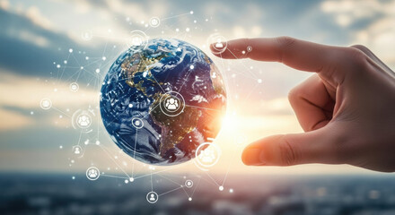A hand holds a glowing Earth globe surrounded by a digital network against a cloudy sunset sky, symbolizing global technology and communication.