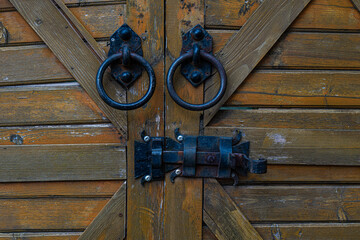 Old door with iron handles