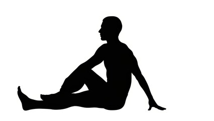 Silhouette of a person performing a seated spinal twist yoga pose