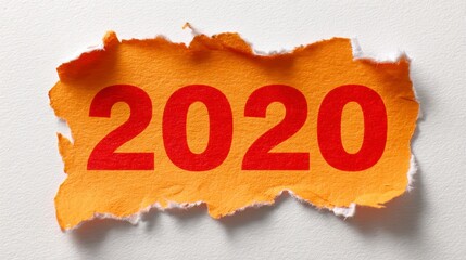 Close-up of ripped, textured yellow paper with red numerals displaying the year 2020 against a white background. The torn edges create an abstract look