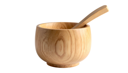 A wooden bowl with a wooden spoon inside, set against a solid black background. The bowl's natural wood grain is visible