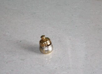 A silver container with gold-coated screw-cap. A precious gift on marriage.