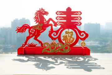 Chinese New Year of Horse 2026 mascot with shadow at horizontal composition translation of the Chinese words are fortune and springtime no logo no trademark