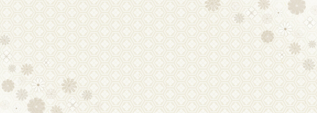 亀甲文様と菊文様が広がる生成り色の和紙テクスチャ