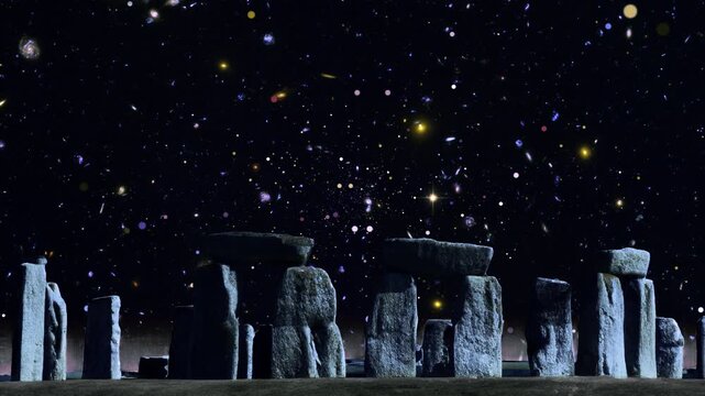 Stonehenge at night. Space background at the famous Stonehenge prehistoric monuments, a massive stone circle located on Salisbury Plain in Wiltshire, England, about 8 miles (13 km) north of Salisbury.
