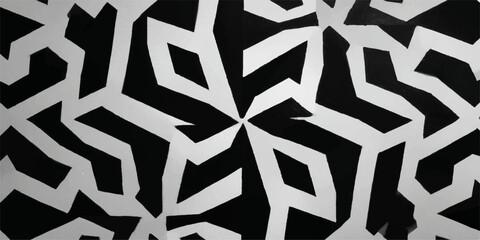 black and white pattern composed of geometric shapes. The design includes various interlocking and overlapping forms, creating a sense of depth and complexity. 